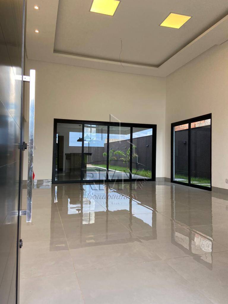 Casa de Condomínio à venda com 3 quartos, 412m² - Foto 3